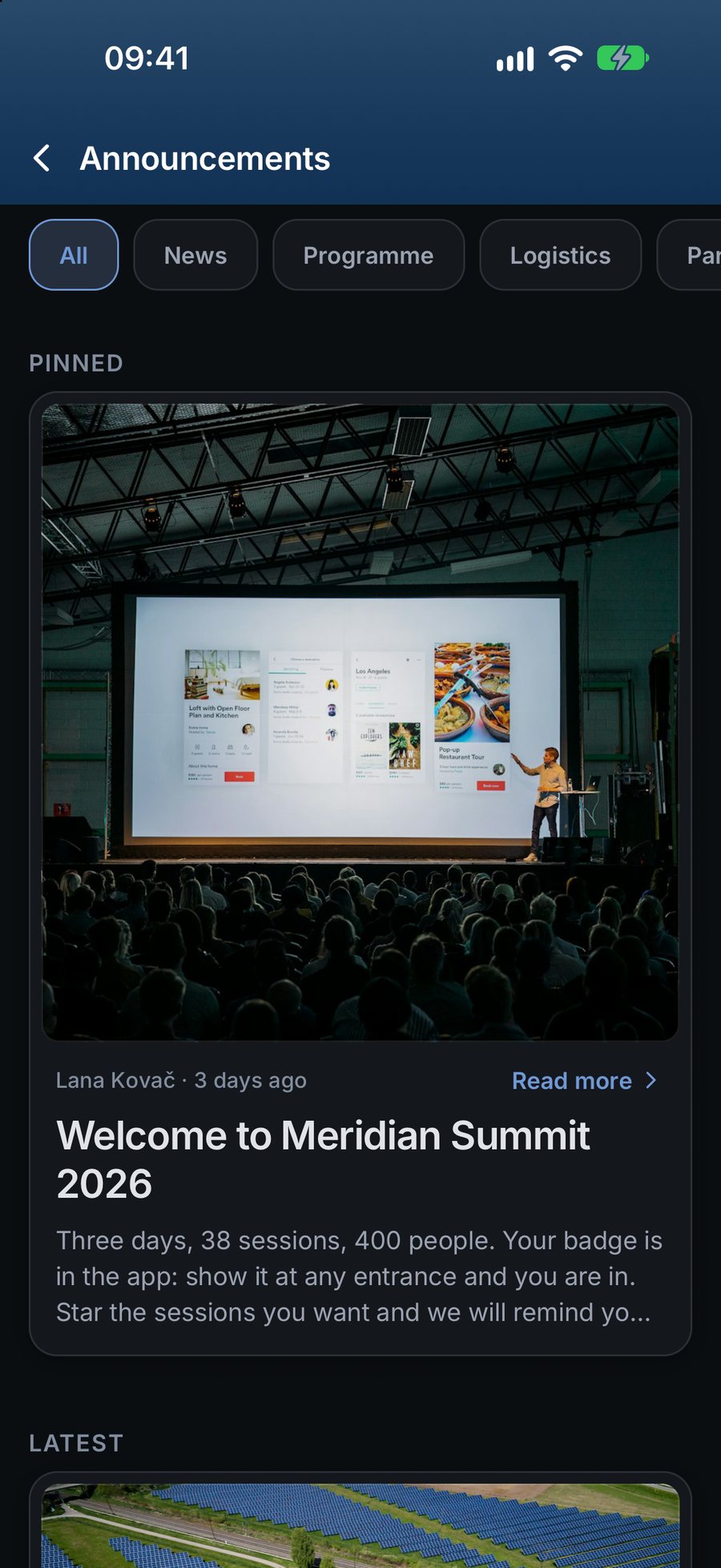 Attend app news feed in dark theme with organiser announcements